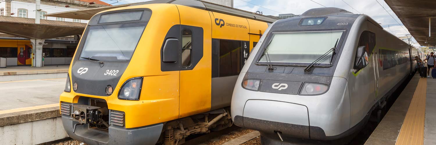 Alfa Pendular and Porto Urban Train stopped next to the platform.