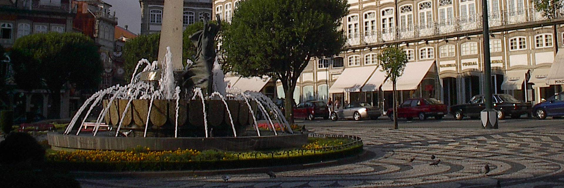 Toural Square with a fountain in the foreground.