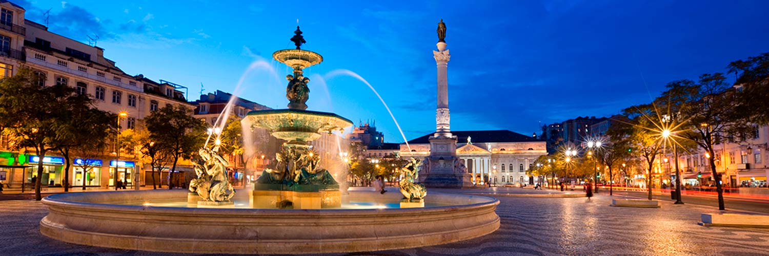 The South Fountain of Rossio Square, in Dom Pedro IV Square, statue of Dom Pedro IV in the center and the Dona Maria II Theatre in the background.