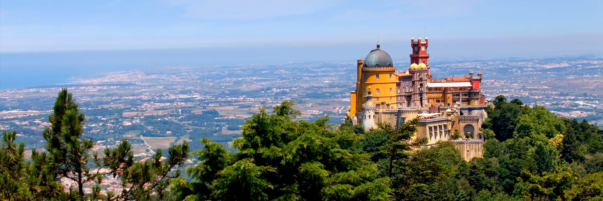 Pena Palace and the lower part of the municipality, with the sea in the background.