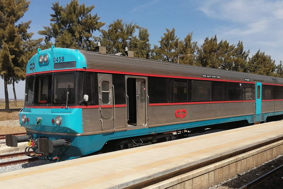 CP 0450 series diesel railcar for regional services and with blue and gray livery parked on one of the station lines.