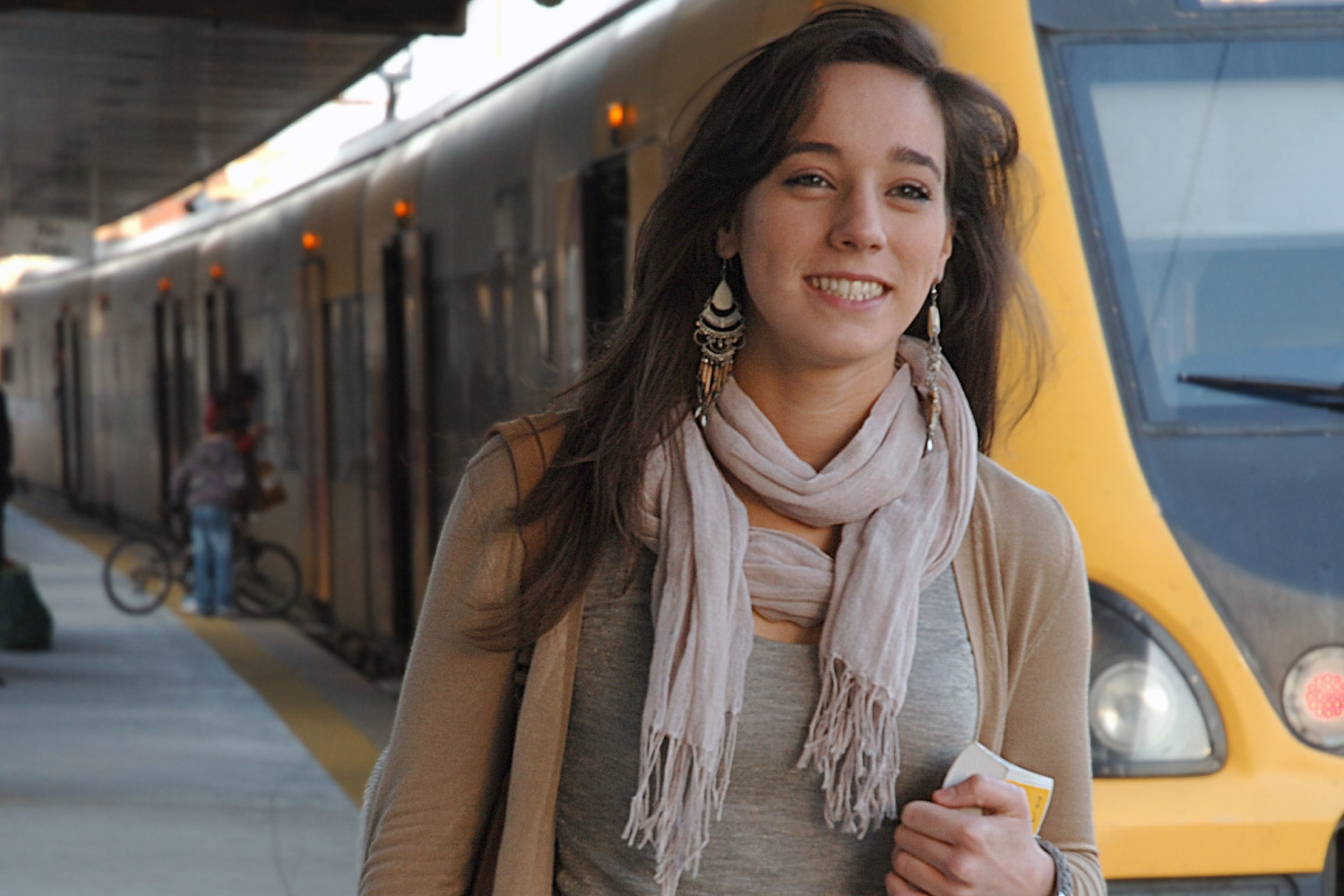 Girl near a Porto urban train.
