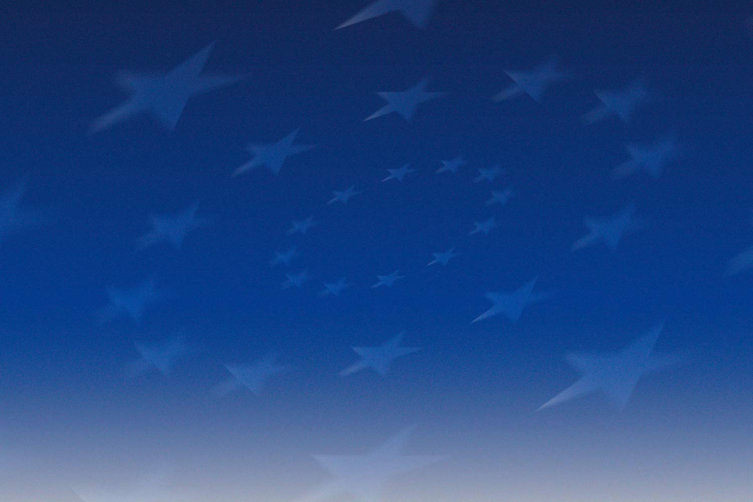 Imagem em tons de cor azul, com estrelas.